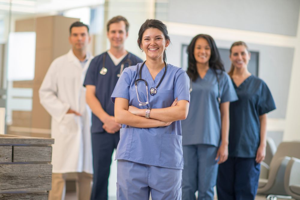 Staff hiring Permanent healthcare professionals stading outside the hospital