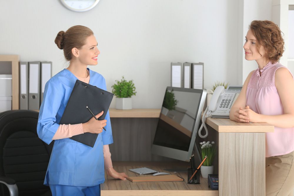 receptionist interacting with customer